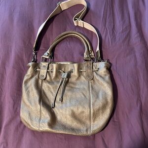 Gold Shoulder Bag with Adjustable Strap and Metal Hardware